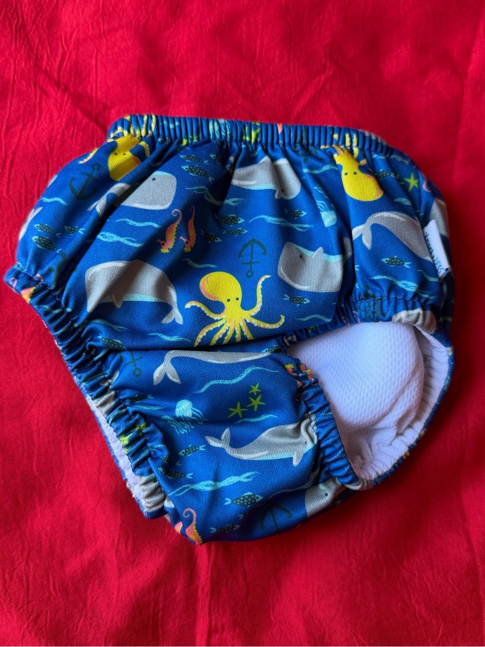 i play. Blue Ocean Animal Swim Trunks with Yellow Octopus